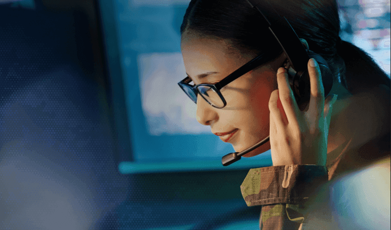 Mattermost source image showing a person working at a collaborative operations desk